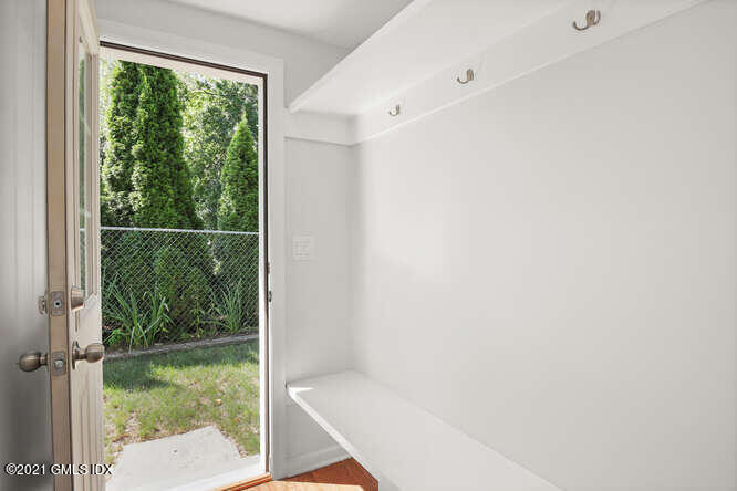 33 Sunshine Avenue Riverside, CT 06878 - Photo 11 of 26 a view of a glass door with a window