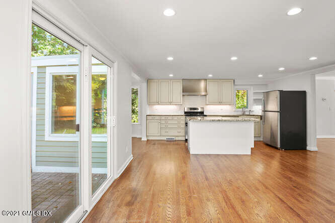33 Sunshine Avenue Riverside, CT 06878 - Photo 6 of 26 a view of kitchen with wooden floor