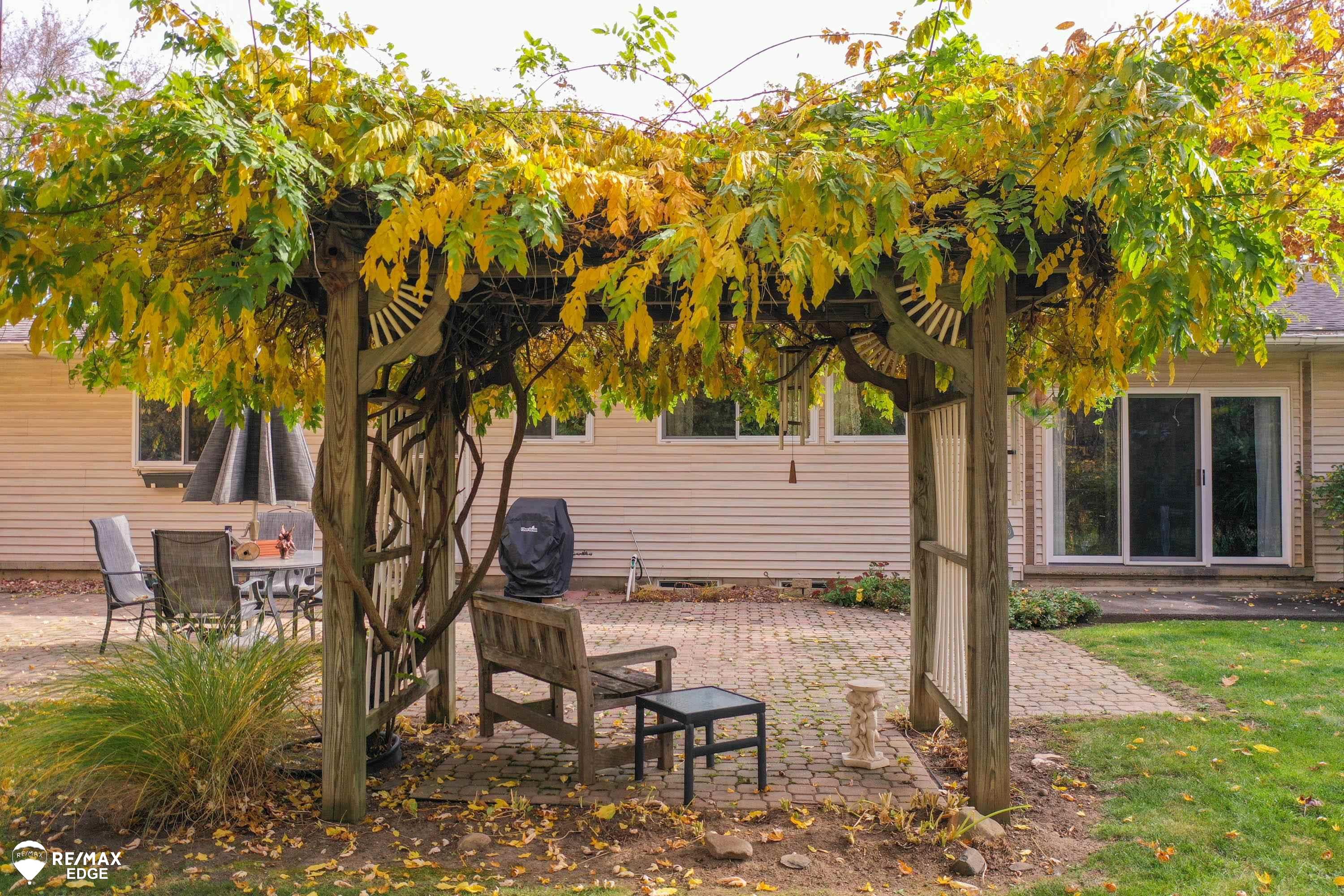 8047 North Seymour Road Flushing, MI 48433 - Photo 40 of 47 Backyard-Wisteria Arbor
