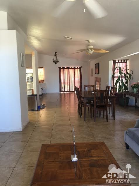 68625 Durango Road Cathedral City, CA 92234 - Photo 4 of 32 a view of a dining room with furniture