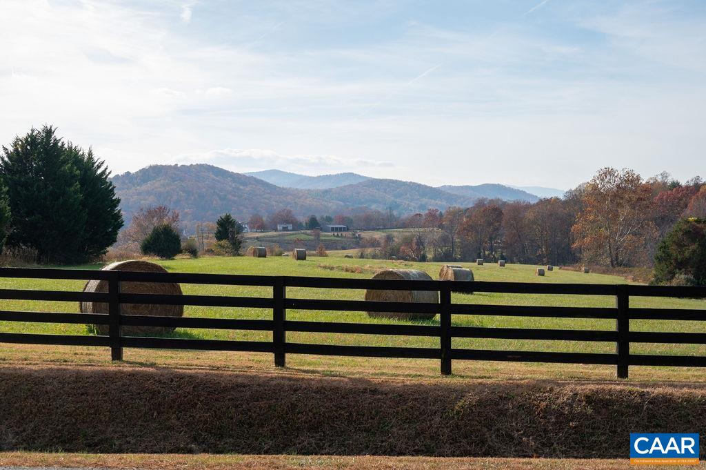 Tbd Red Hill Road Charlottesville, VA 22903 - Photo 49 of 50 a view of a yard with a bench and wooden fence