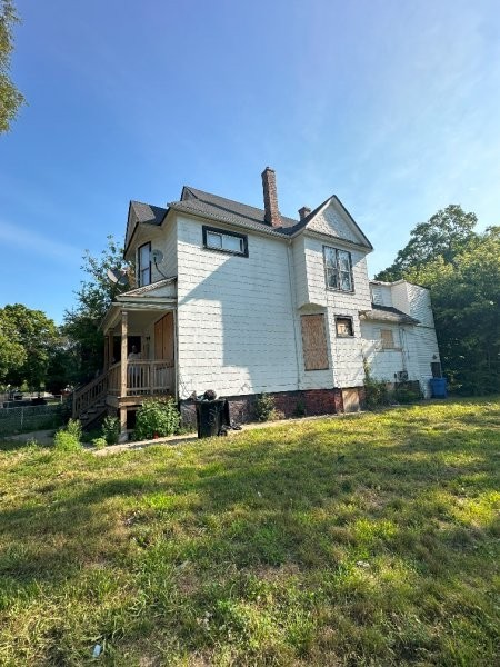 7119 South Emerald Avenue Chicago, IL 60621 - Photo 2 of 50 a front view of house with yard and green space