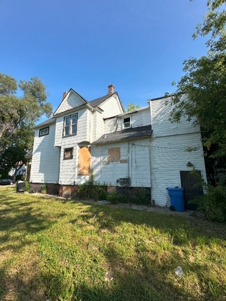 7119 South Emerald Avenue Chicago, IL 60621 - Photo 3 of 50 a view of a house with a yard