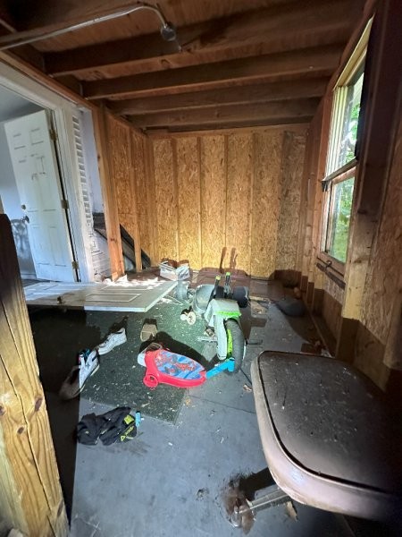7119 South Emerald Avenue Chicago, IL 60621 - Photo 35 of 50 a living room with furniture and a chandelier