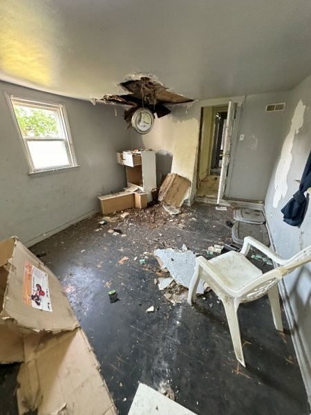 7119 South Emerald Avenue Chicago, IL 60621 - Photo 36 of 50 a view of a room that has a table and chairs in it