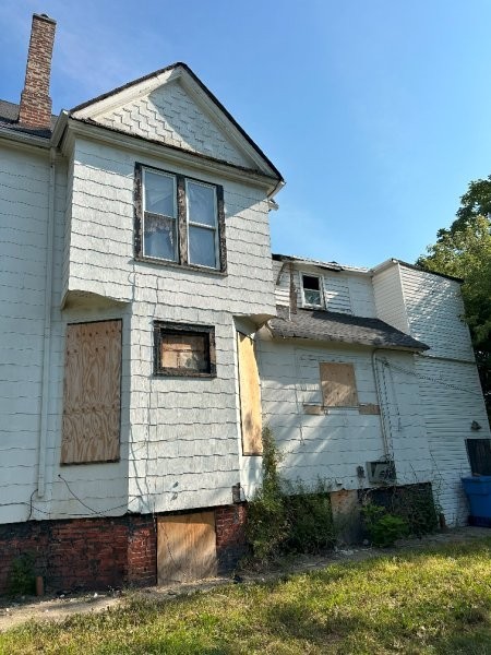 7119 South Emerald Avenue Chicago, IL 60621 - Photo 4 of 50 a front view of a house with a yard