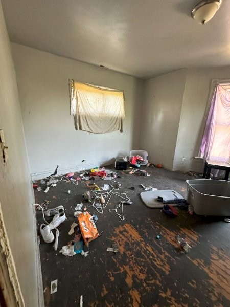 7119 South Emerald Avenue Chicago, IL 60621 - Photo 43 of 50 a room with toys and dresser