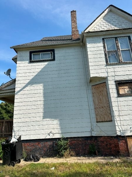 7119 South Emerald Avenue Chicago, IL 60621 - Photo 5 of 50 a front view of a house with garden