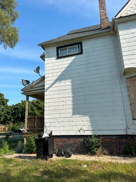 7119 South Emerald Avenue Chicago, IL 60621 - Photo 6 of 50 a front view of a house with a yard