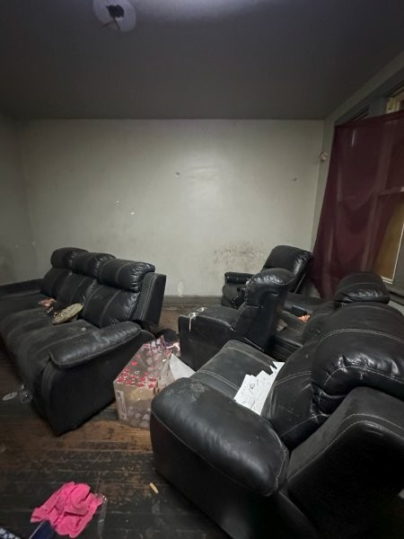 7119 South Emerald Avenue Chicago, IL 60621 - Photo 7 of 50 a living room with furniture and a couch
