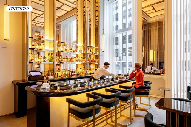 a view of a balcony and chairs and furniture