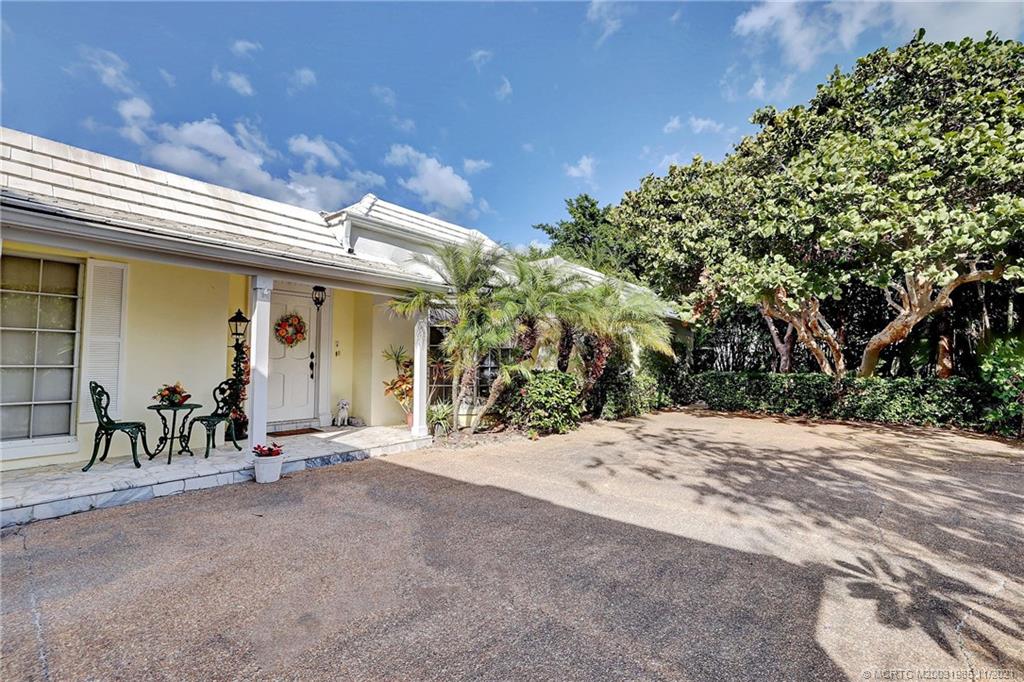 2 Timor Street Sewall's Point, FL 34996 - Photo 6 of 58 a view of a dinning room with a patio