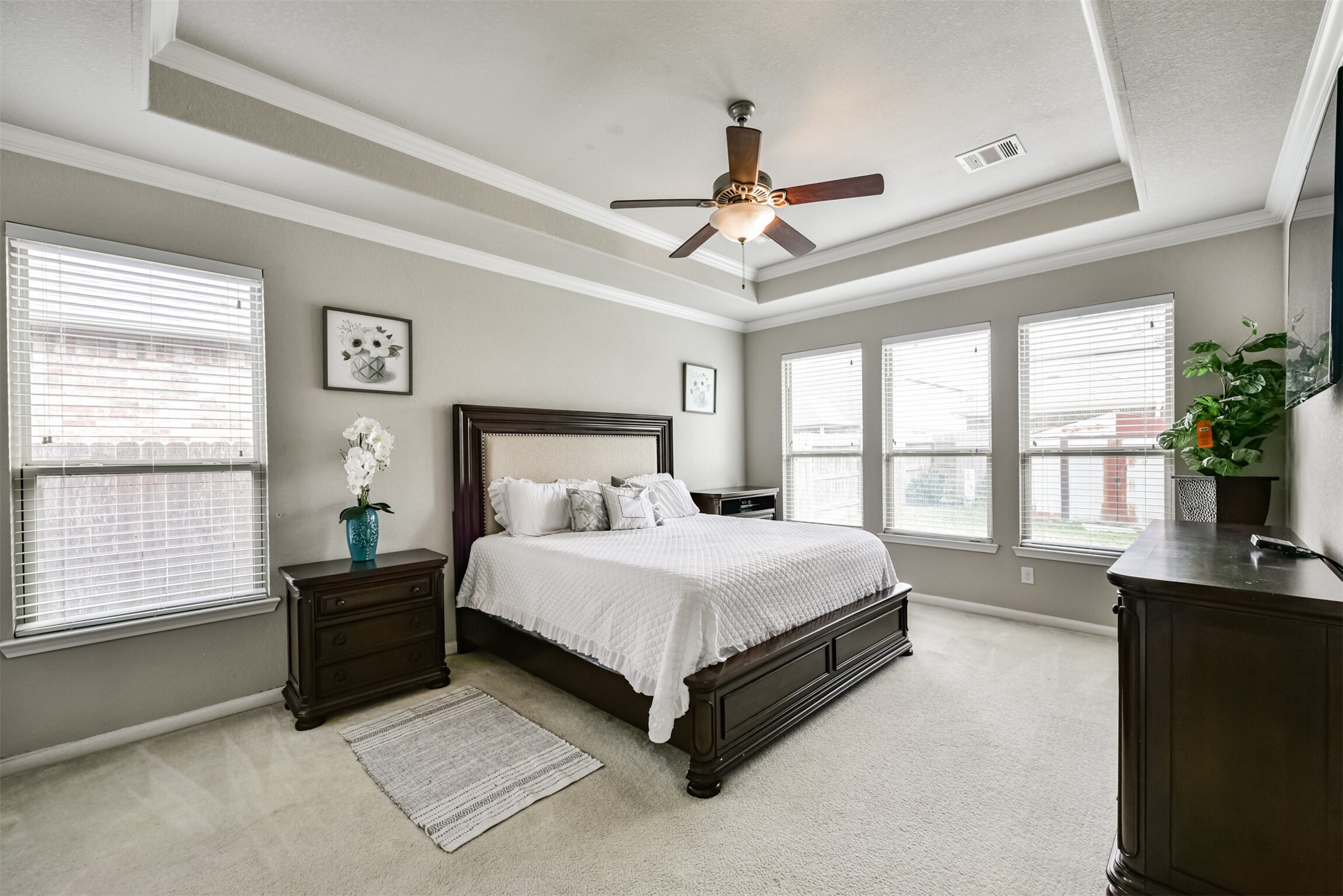 4827 Oak Rambling Drive Katy, TX 77494 - Photo 25 of 45 a bedroom with a large bed and a large window