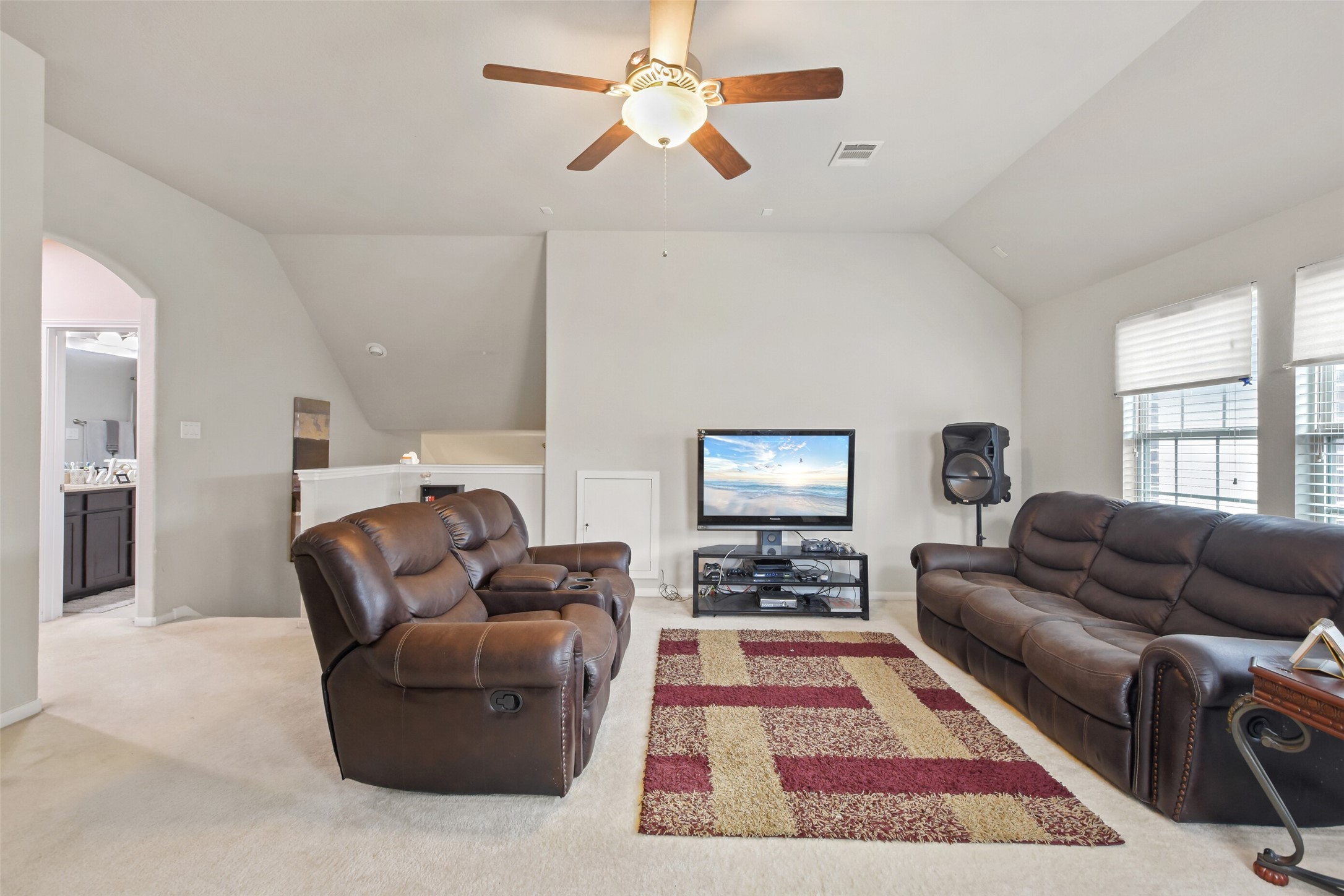 4827 Oak Rambling Drive Katy, TX 77494 - Photo 32 of 45 a living room with furniture ceiling fan and a rug