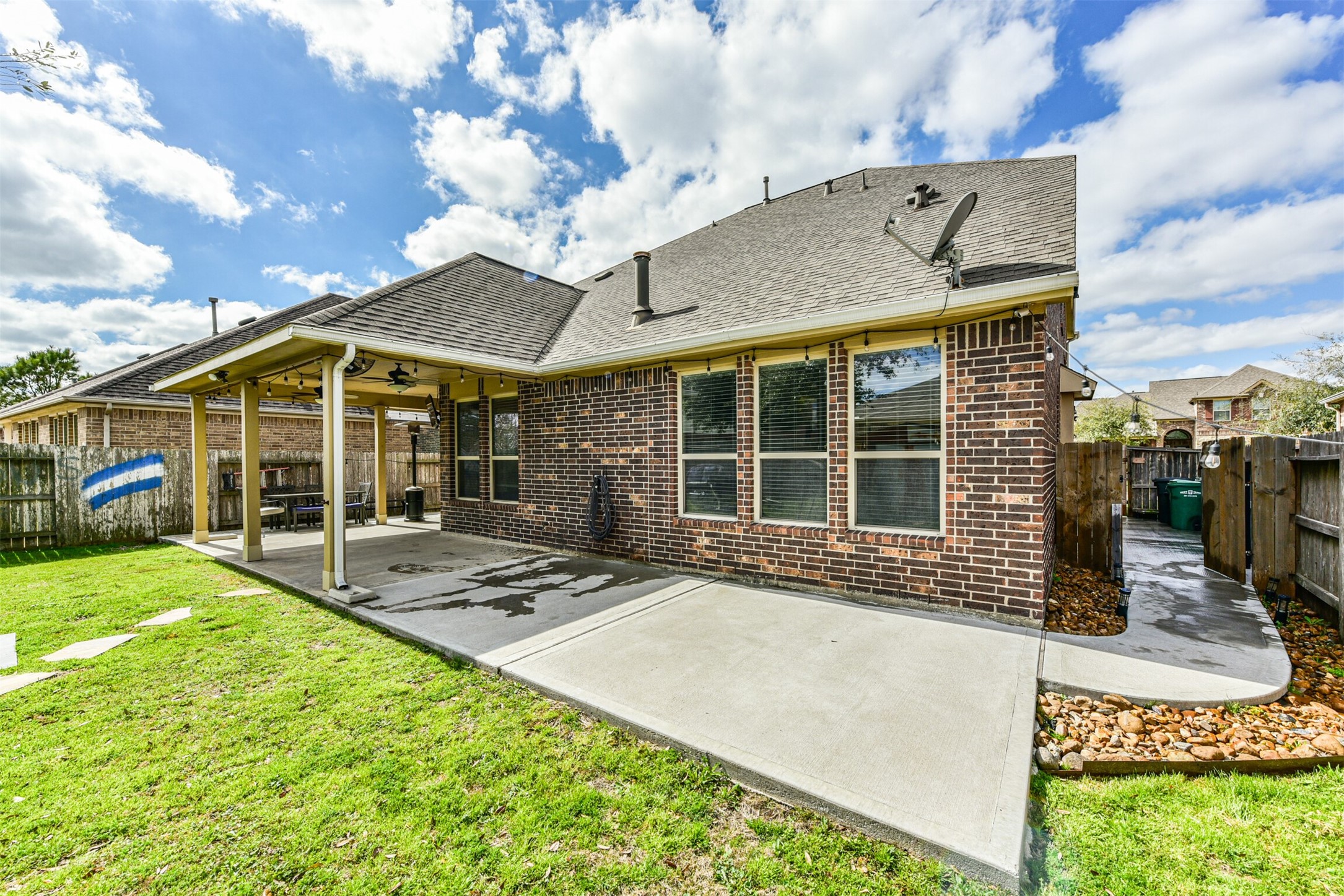 4827 Oak Rambling Drive Katy, TX 77494 - Photo 41 of 45 a view of a house with backyard and sitting area