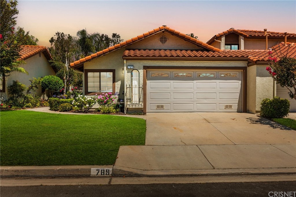 789 Congressional Road Simi Valley, CA 93065 - Photo 1 of 1 a front view of a house with a garden
