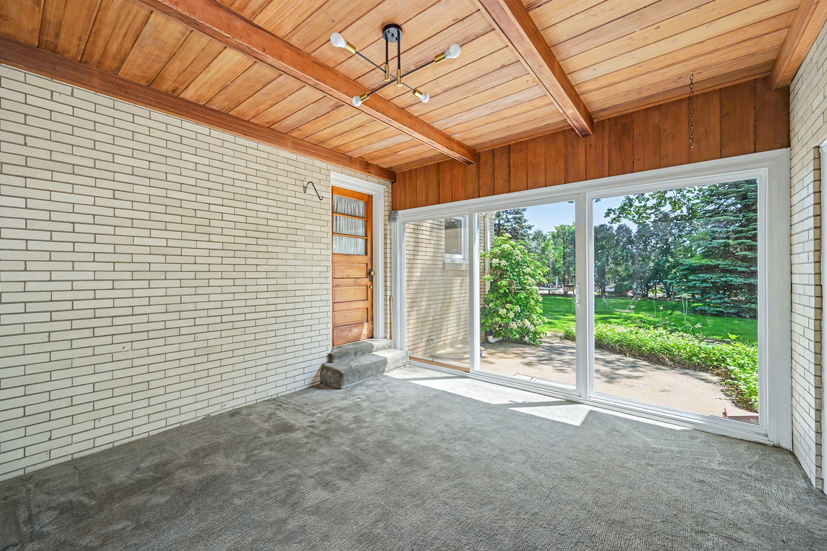325 South Lambert Road Glen Ellyn, IL 60137 - Photo 22 of 32 a view of a backyard