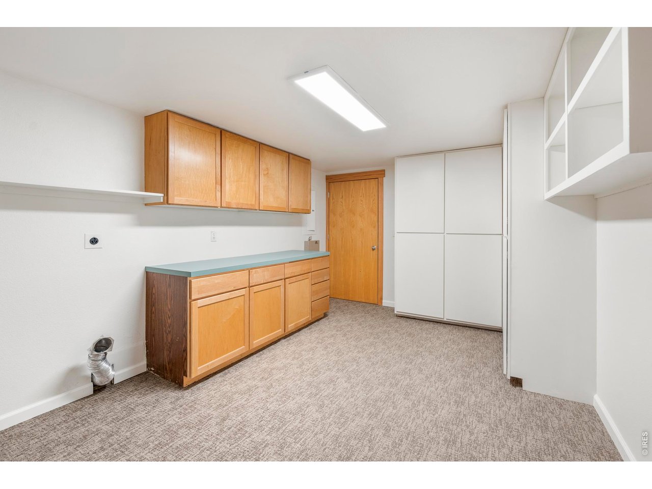 121 Leonards Road Boulder, CO 80302 - Photo 29 of 44 a kitchen with a sink cabinets and a window