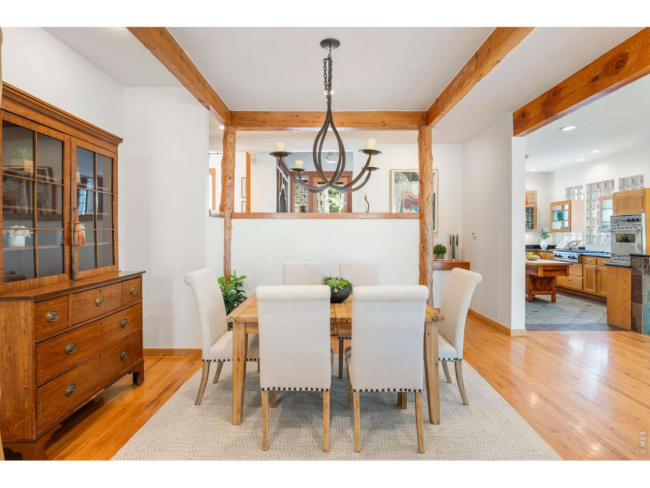 121 Leonards Road Boulder, CO 80302 - Photo 9 of 44 a view of a dining room with furniture and wooden floor