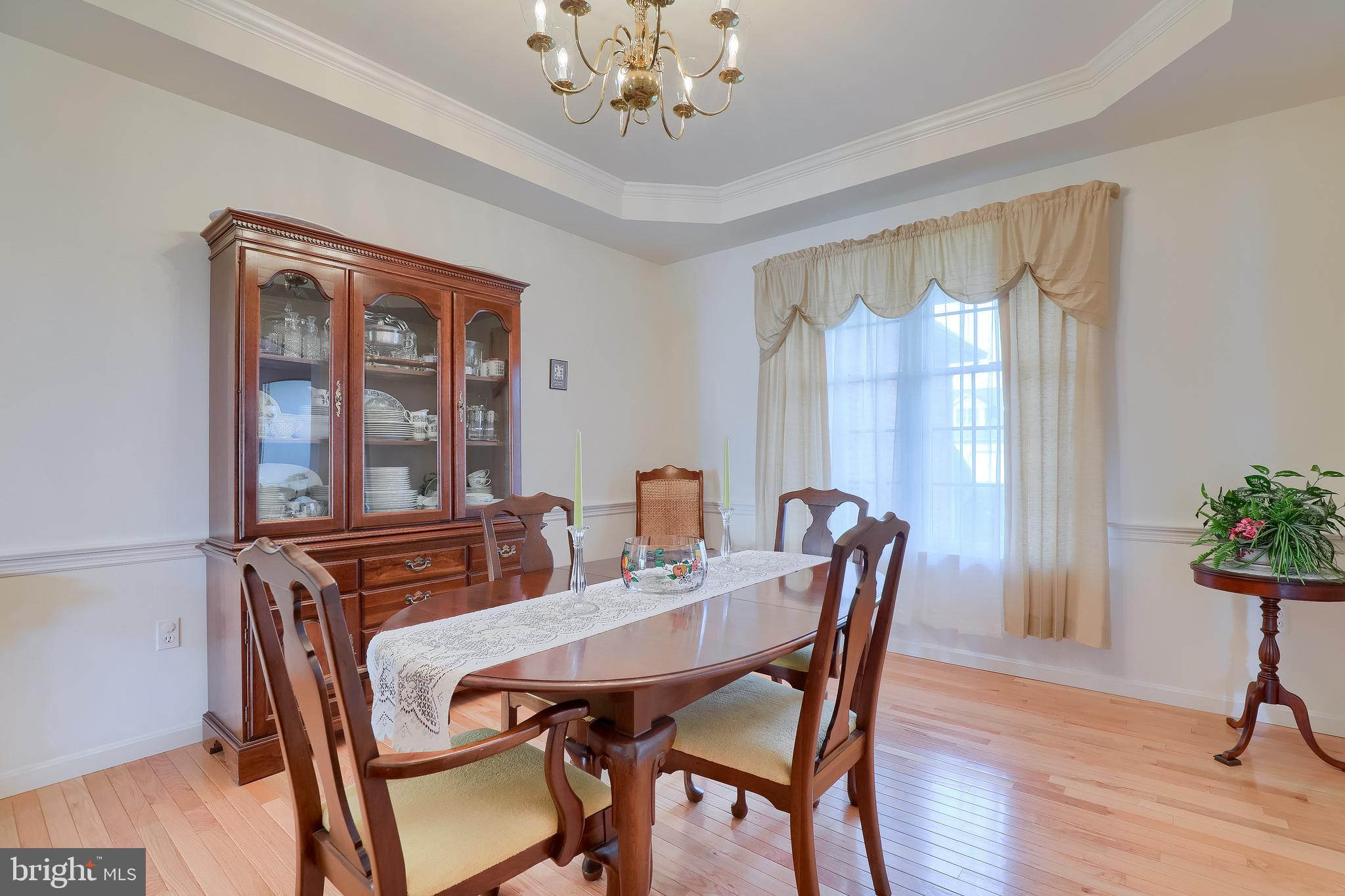 430 Wagonwheel Road Lititz, PA 17543 - Photo 11 of 51 a view of a dining room with furniture window and wooden floor