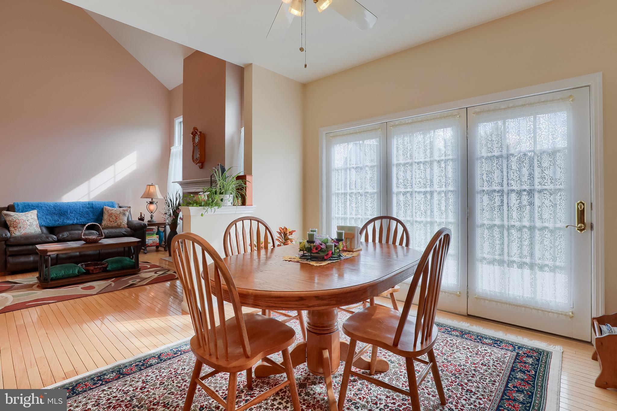 430 Wagonwheel Road Lititz, PA 17543 - Photo 18 of 51 a dining room with furniture a chandelier and wooden floor