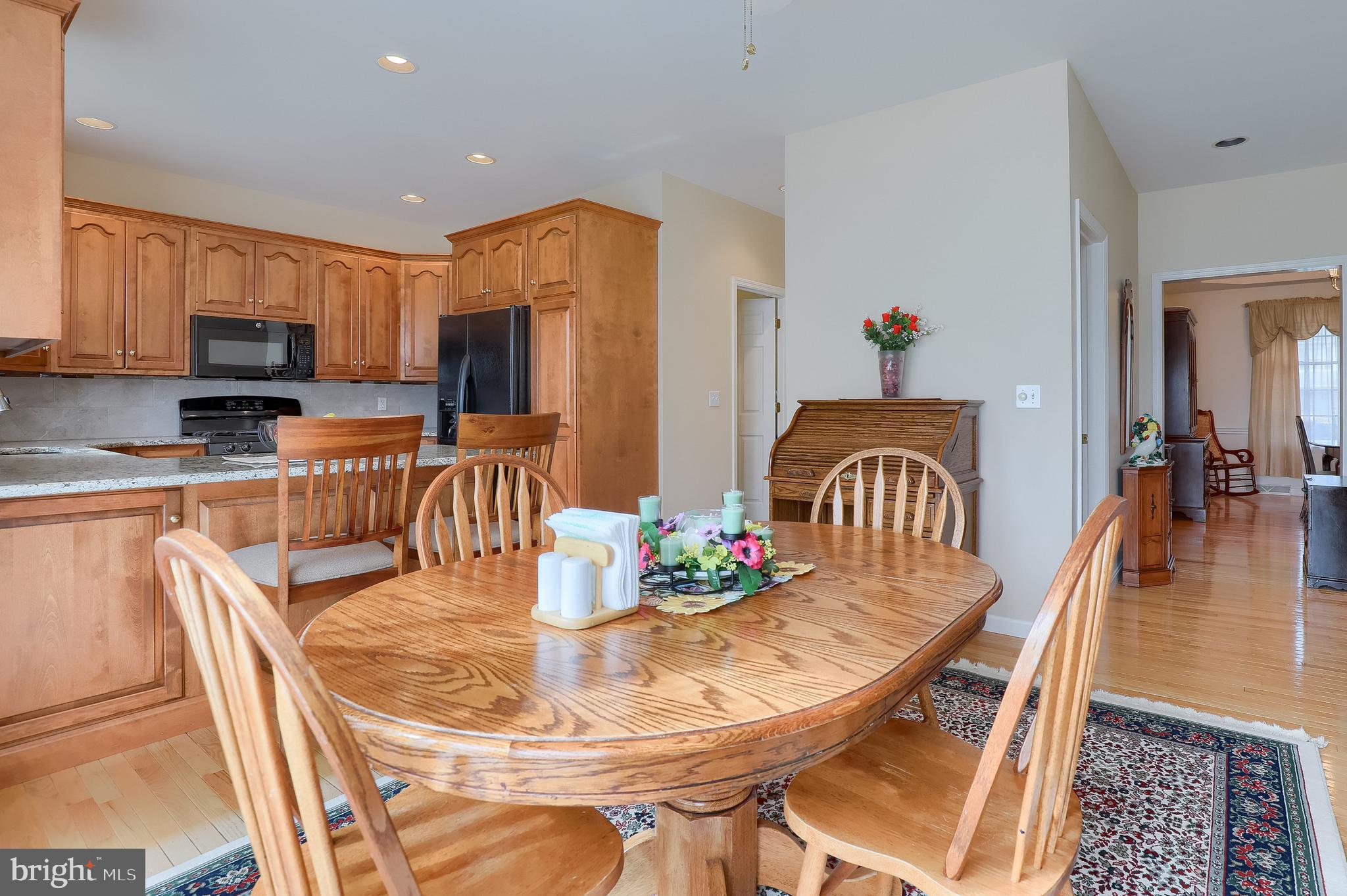 430 Wagonwheel Road Lititz, PA 17543 - Photo 19 of 51 a dining room with furniture and wooden floor