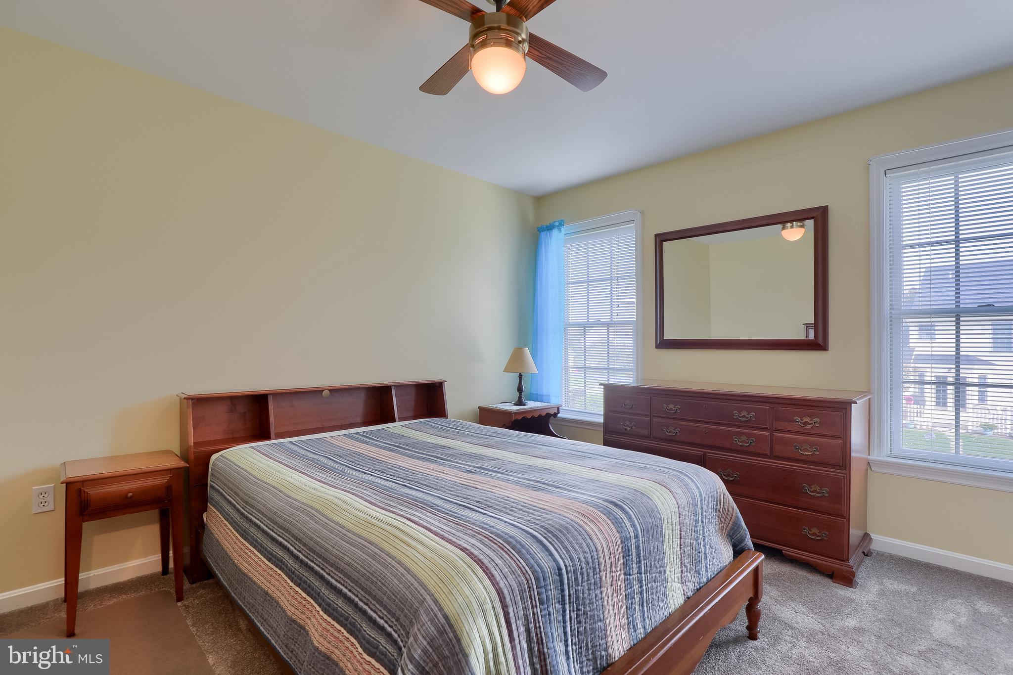 430 Wagonwheel Road Lititz, PA 17543 - Photo 28 of 51 a bedroom with a bed and a chandelier