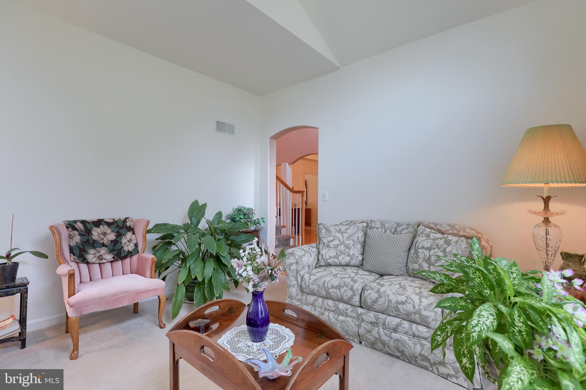 430 Wagonwheel Road Lititz, PA 17543 - Photo 6 of 51 a living room with furniture and a potted plant