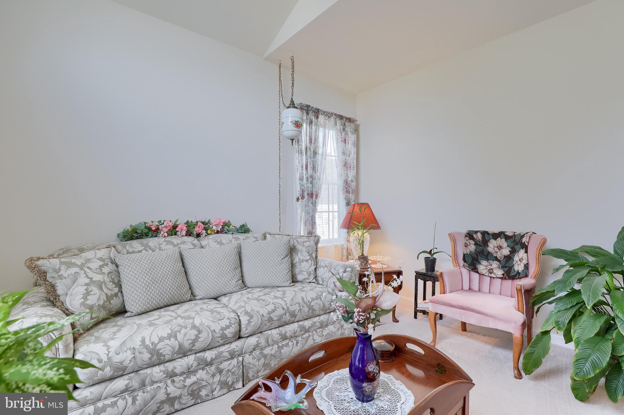 430 Wagonwheel Road Lititz, PA 17543 - Photo 7 of 51 a living room with furniture and a chandelier