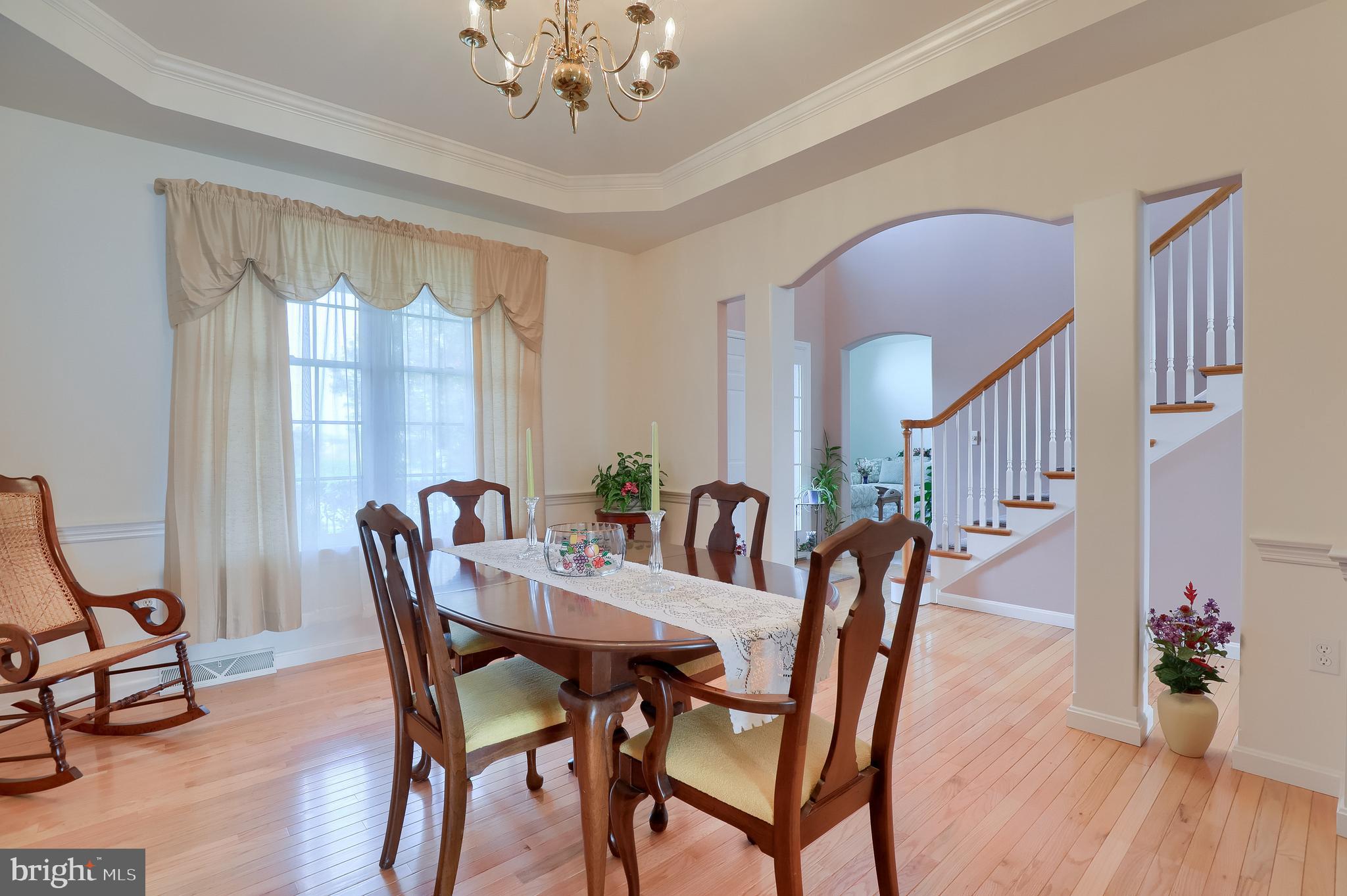 430 Wagonwheel Road Lititz, PA 17543 - Photo 10 of 51 a view of a dining room with furniture window and wooden floor