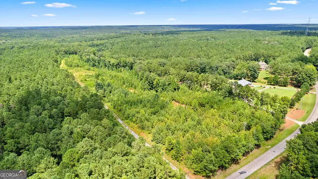 a view of outdoor space with deck and yard