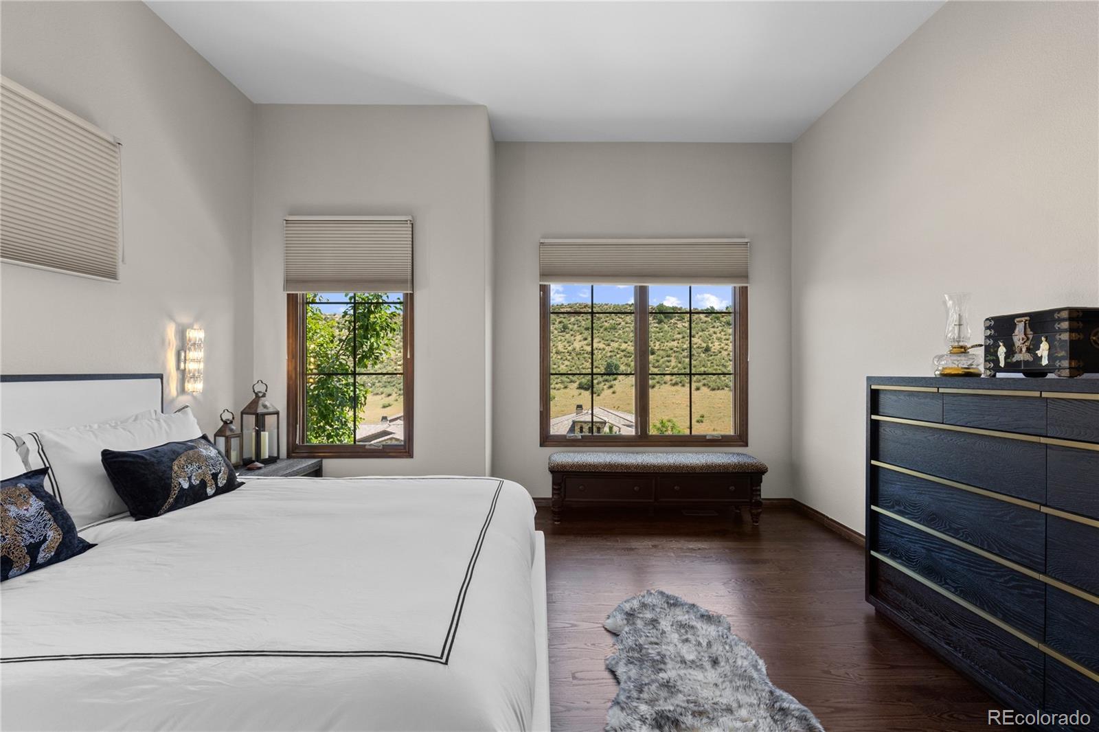 8000 Raphael Lane Littleton, CO 80125 - Photo 21 of 47 a bedroom with a bed and a window