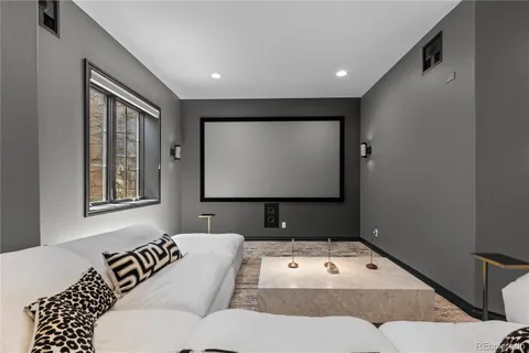 a living room with a couch and a flat screen tv