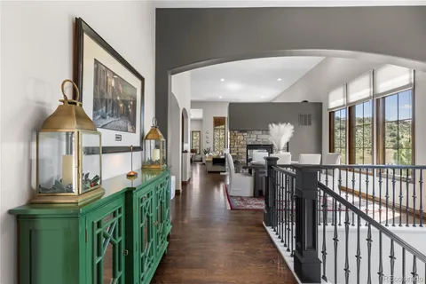 a view of a living room and balcony