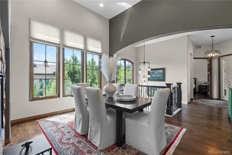 a dining room with furniture window wooden floor