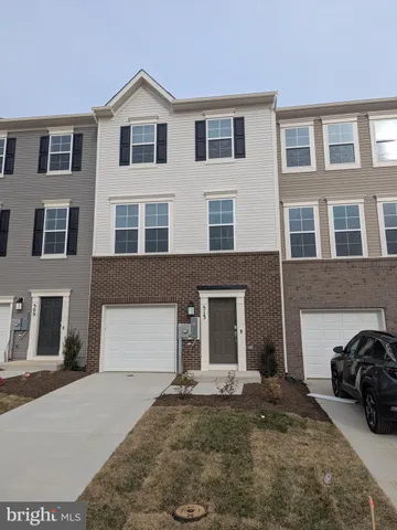 a view of a big house with many windows