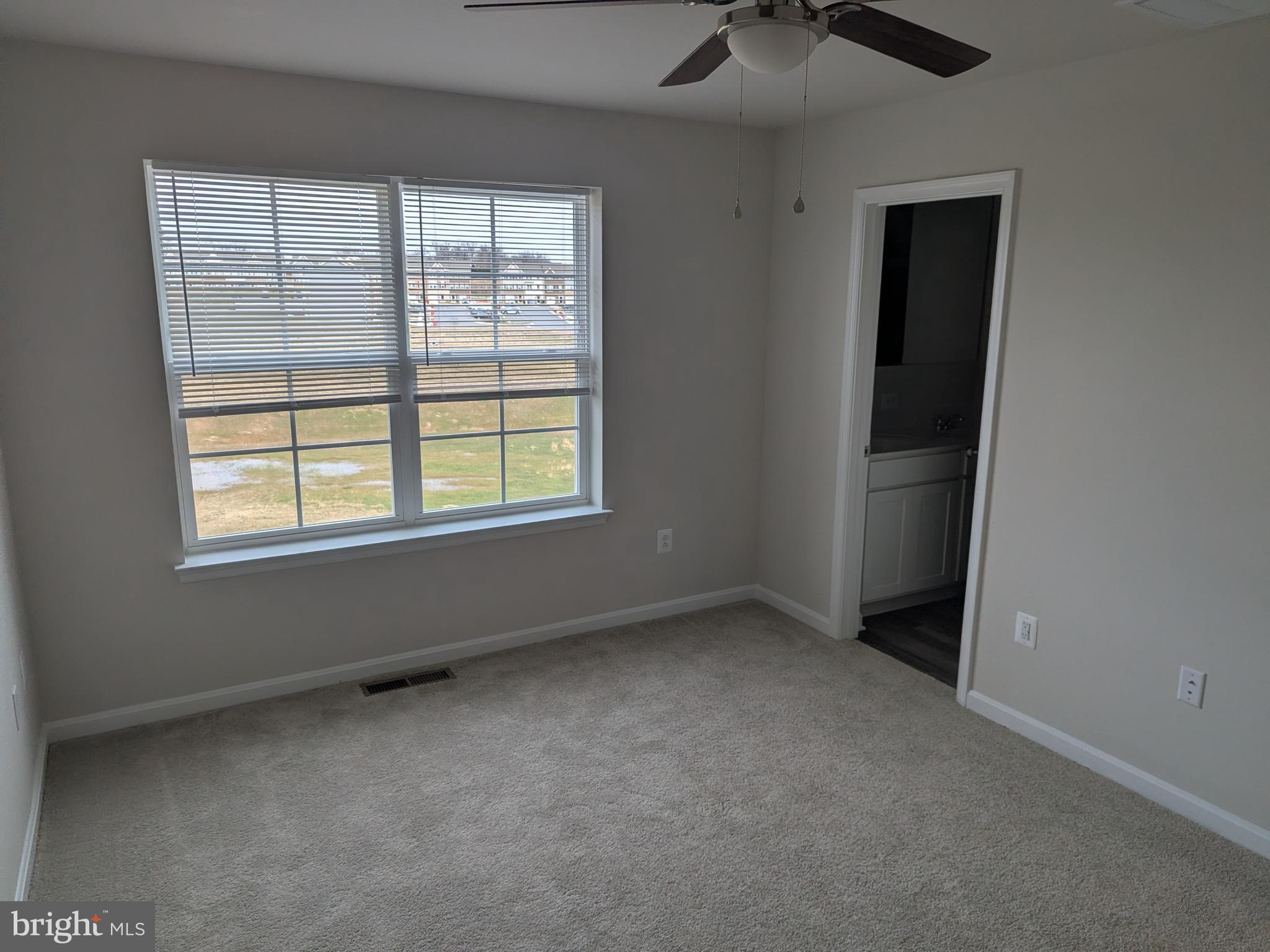 513 Seeback Drive Charles Town, WV 25414 - Photo 24 of 33 an empty room with a window