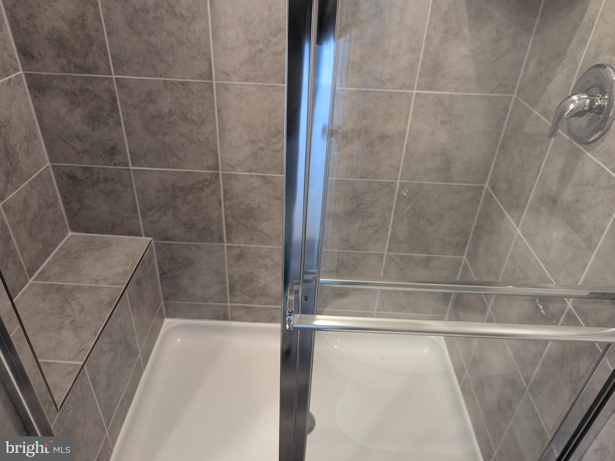 513 Seeback Drive Charles Town, WV 25414 - Photo 27 of 33 a bathroom with a bathtub