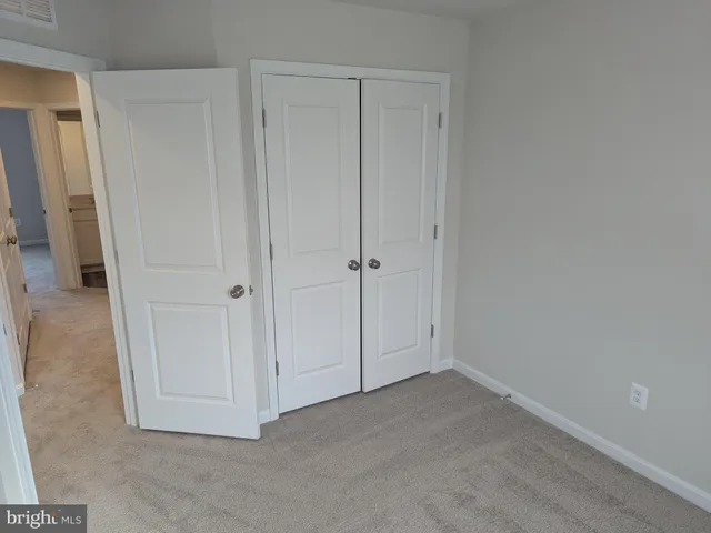 an empty room with a door