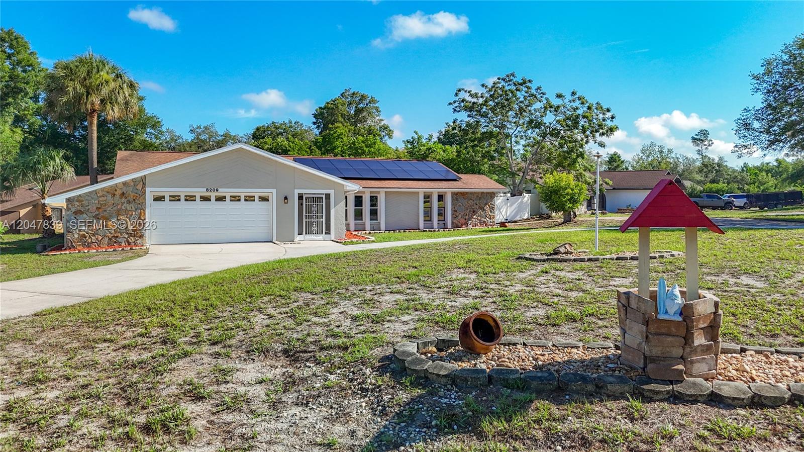 8209 Chaucer Drive Spring Hill, FL 34607 - Photo 3 of 48