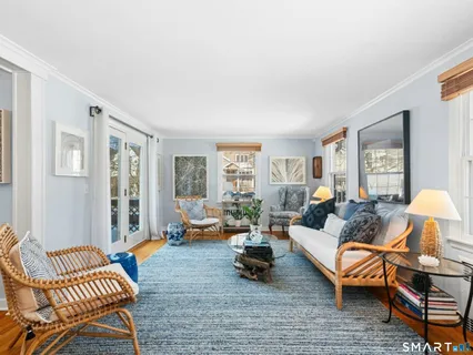 a view of livingroom with furniture and a window