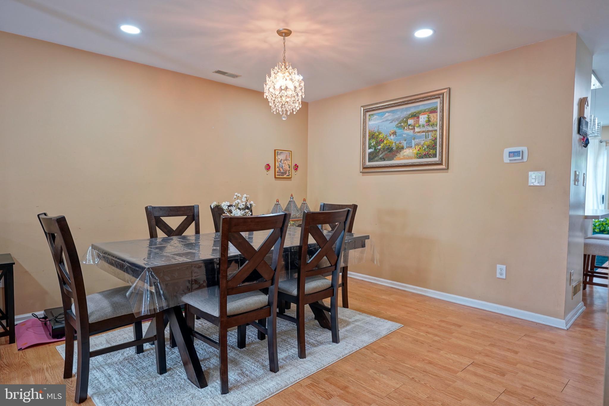 8 Saw Mill Drive Mount Laurel, NJ 08054 - Photo 14 of 37 a view of a dining room with furniture and chandelier