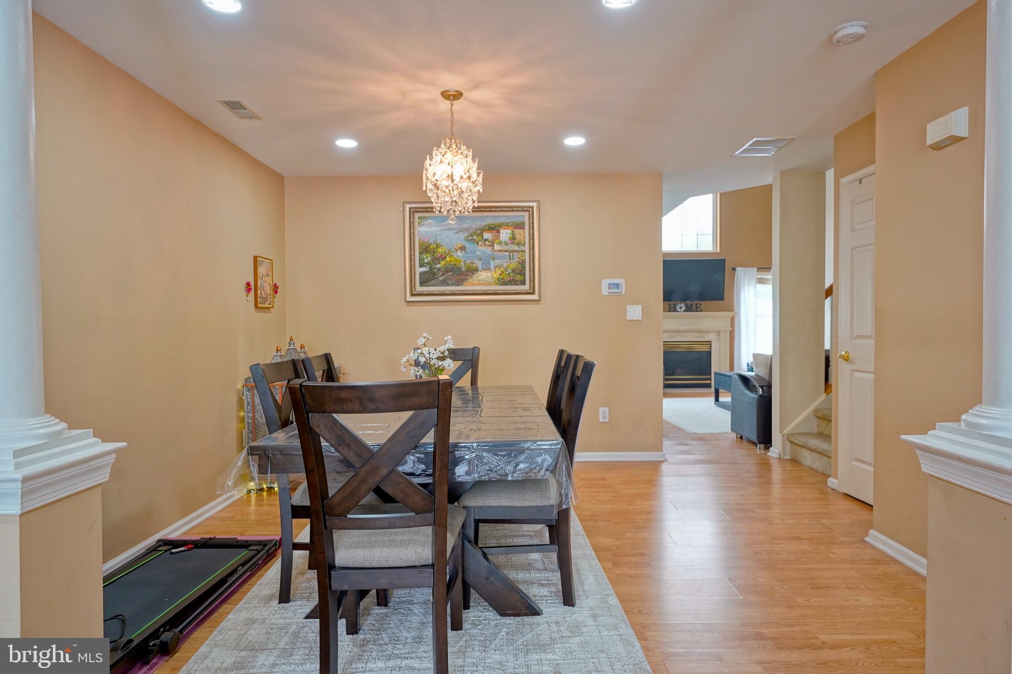 8 Saw Mill Drive Mount Laurel, NJ 08054 - Photo 15 of 37 a view of a dining room with furniture and wooden floor