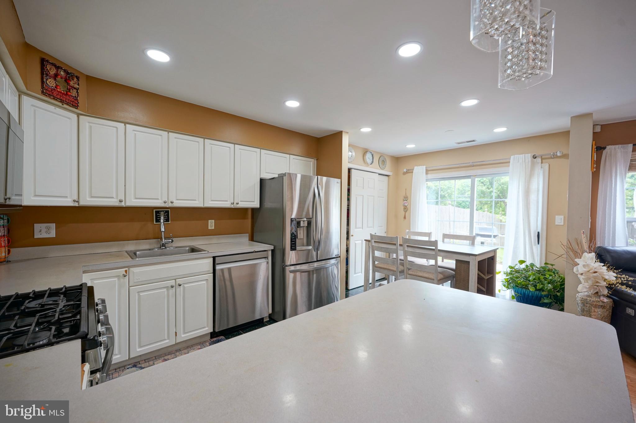 8 Saw Mill Drive Mount Laurel, NJ 08054 - Photo 23 of 37 a kitchen with refrigerator and cabinets
