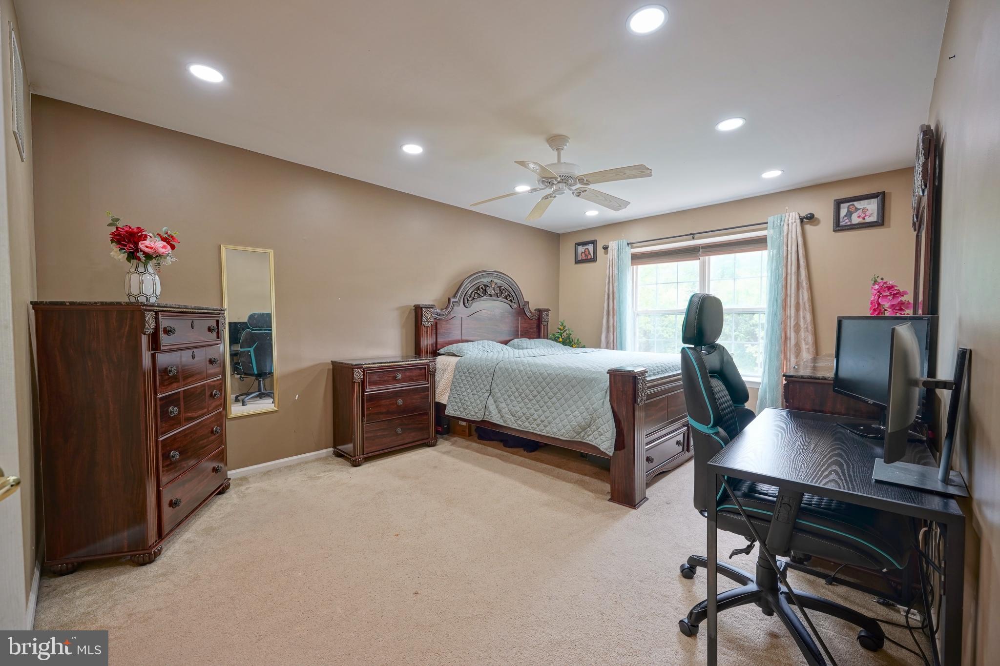 8 Saw Mill Drive Mount Laurel, NJ 08054 - Photo 25 of 37 a bedroom with a bed and a desk
