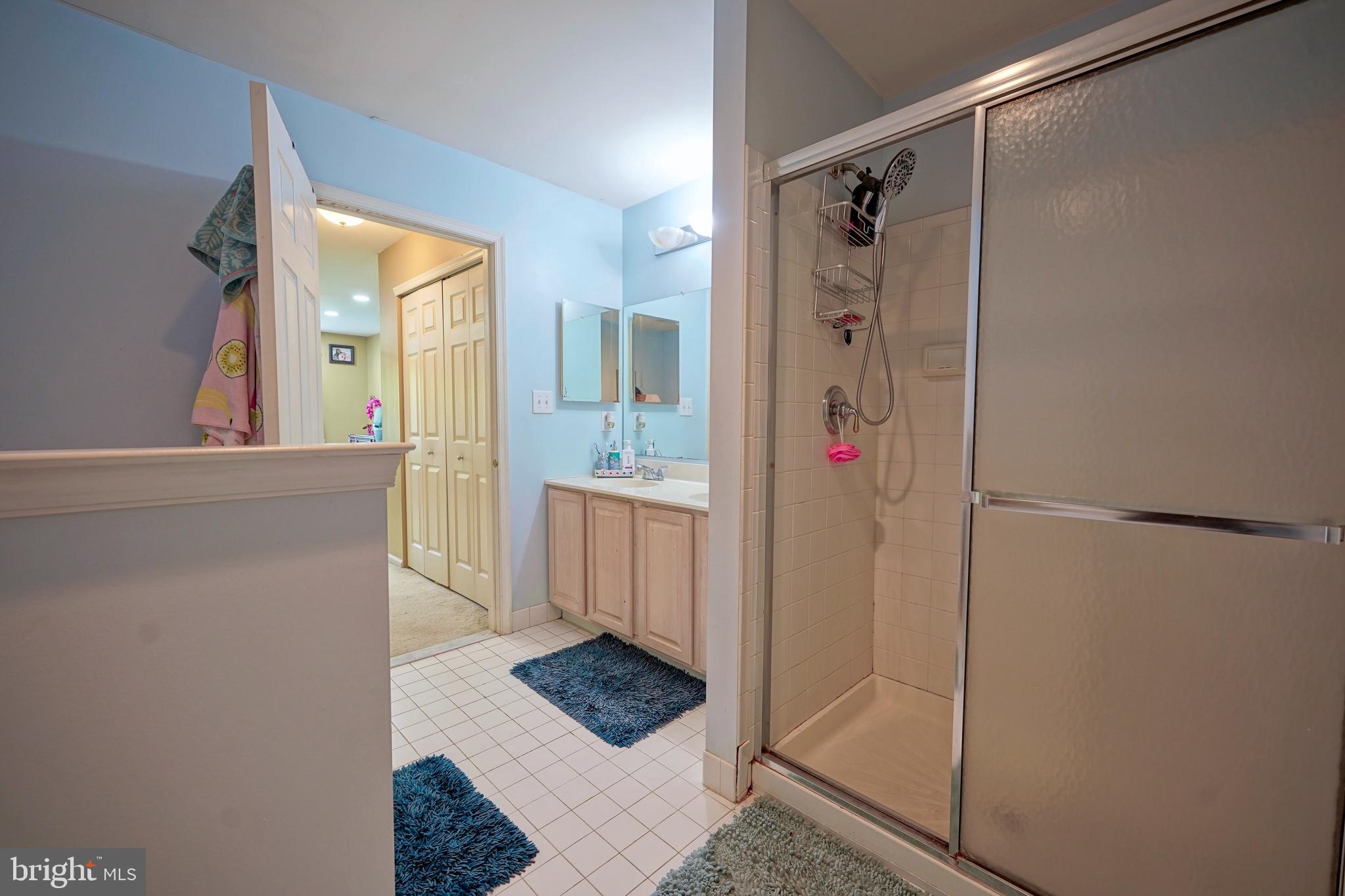 8 Saw Mill Drive Mount Laurel, NJ 08054 - Photo 28 of 37 a bathroom with a shower and a sink