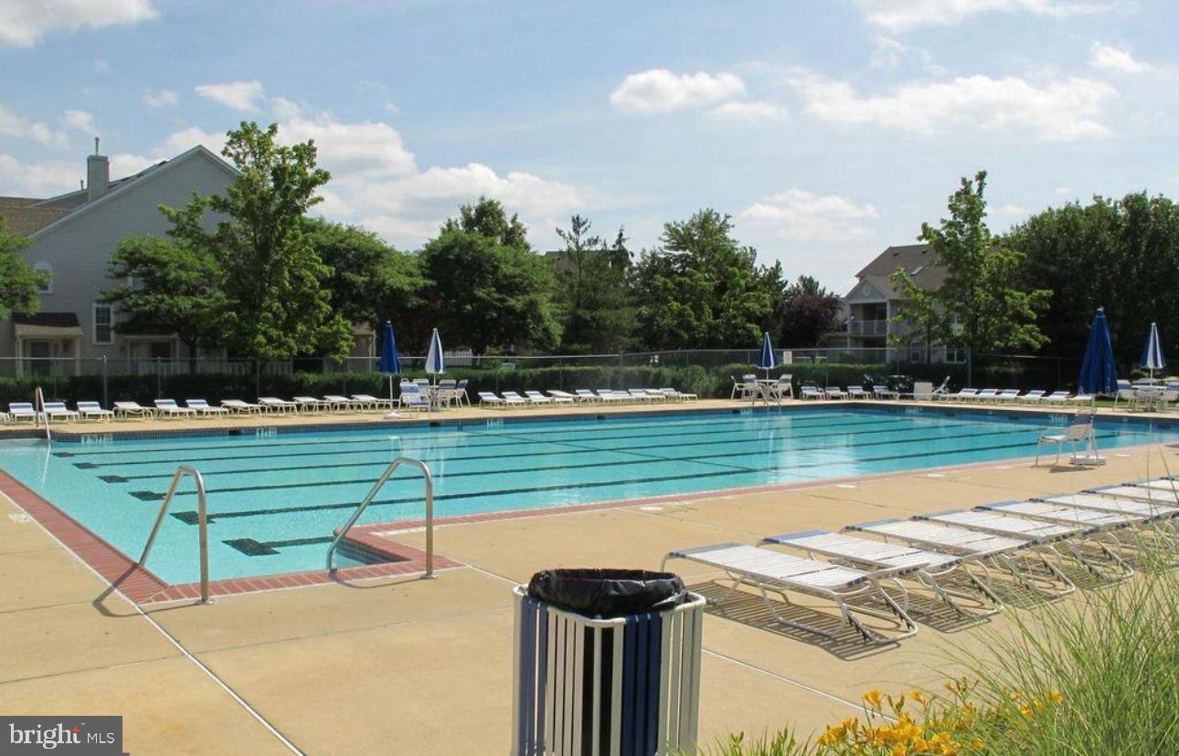 8 Saw Mill Drive Mount Laurel, NJ 08054 - Photo 3 of 37 a view of a swimming pool and outdoor space