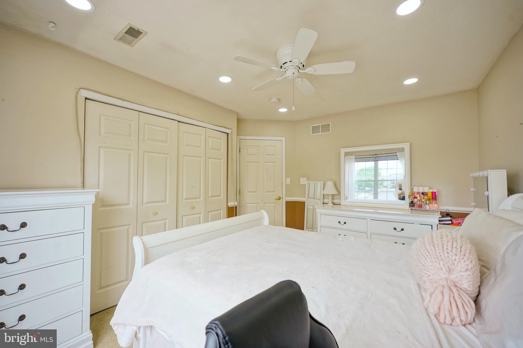 8 Saw Mill Drive Mount Laurel, NJ 08054 - Photo 32 of 37 a bedroom with a bed and a window