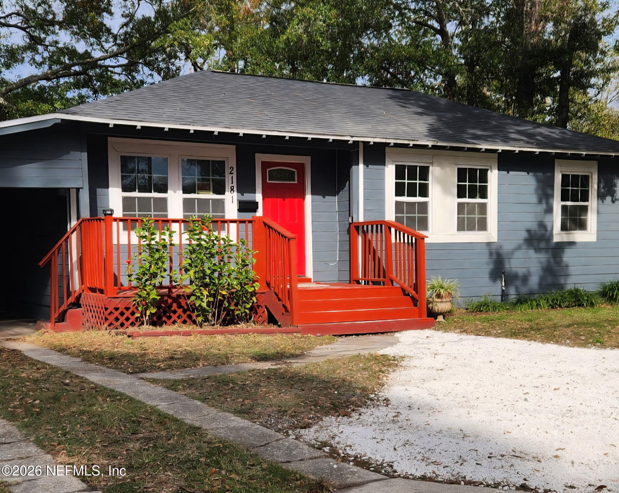 2181 West 17th Street Jacksonville, FL 32209 - Photo 2 of 27 a front view of a house with garden
