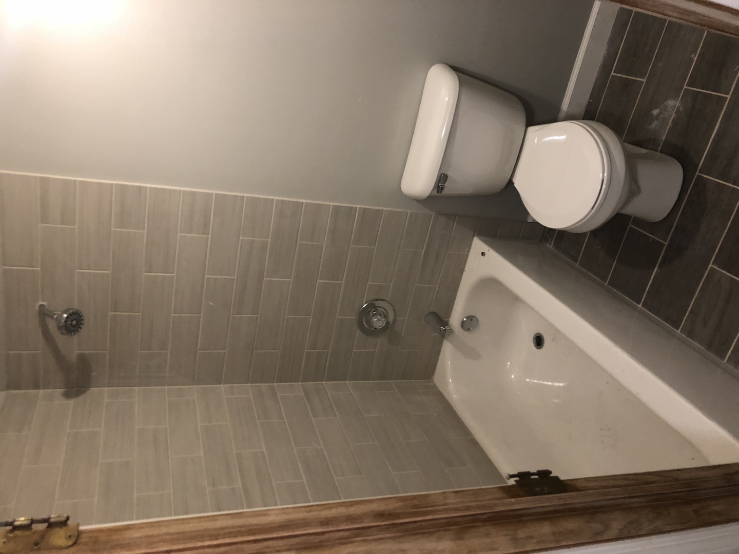 4054 North Sheridan Road, Unit BW Chicago, IL 60613 - Photo 8 of 8 a bathroom with a toilet and a mirror